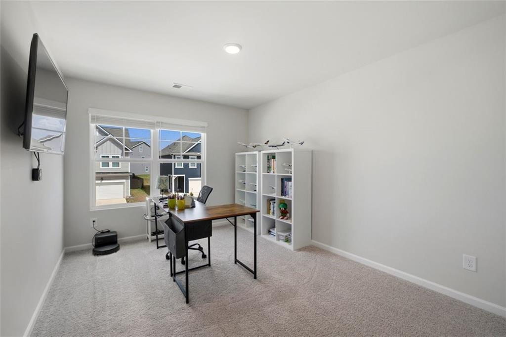 1242 Riverstone Road Jonesboro, GA 30238 - Photo 26 of 38 a view of a workspace with furniture