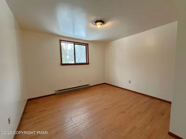 an empty room with a workbench