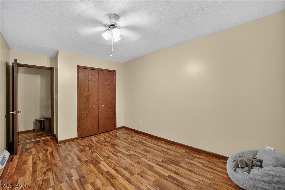 5862 Canterbury Road New Franklin, OH 44319 - Photo 22 of 45 NE Corner bedroom towards double closet and entrance