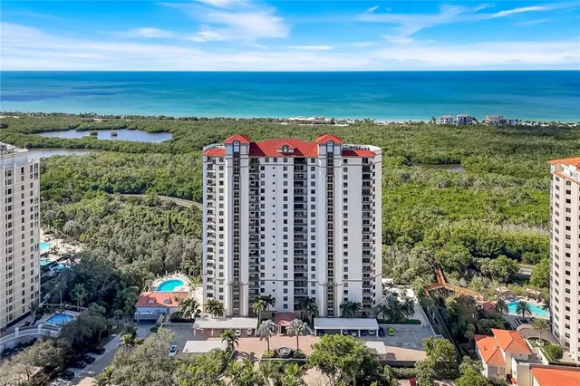 a view of a city with an ocean