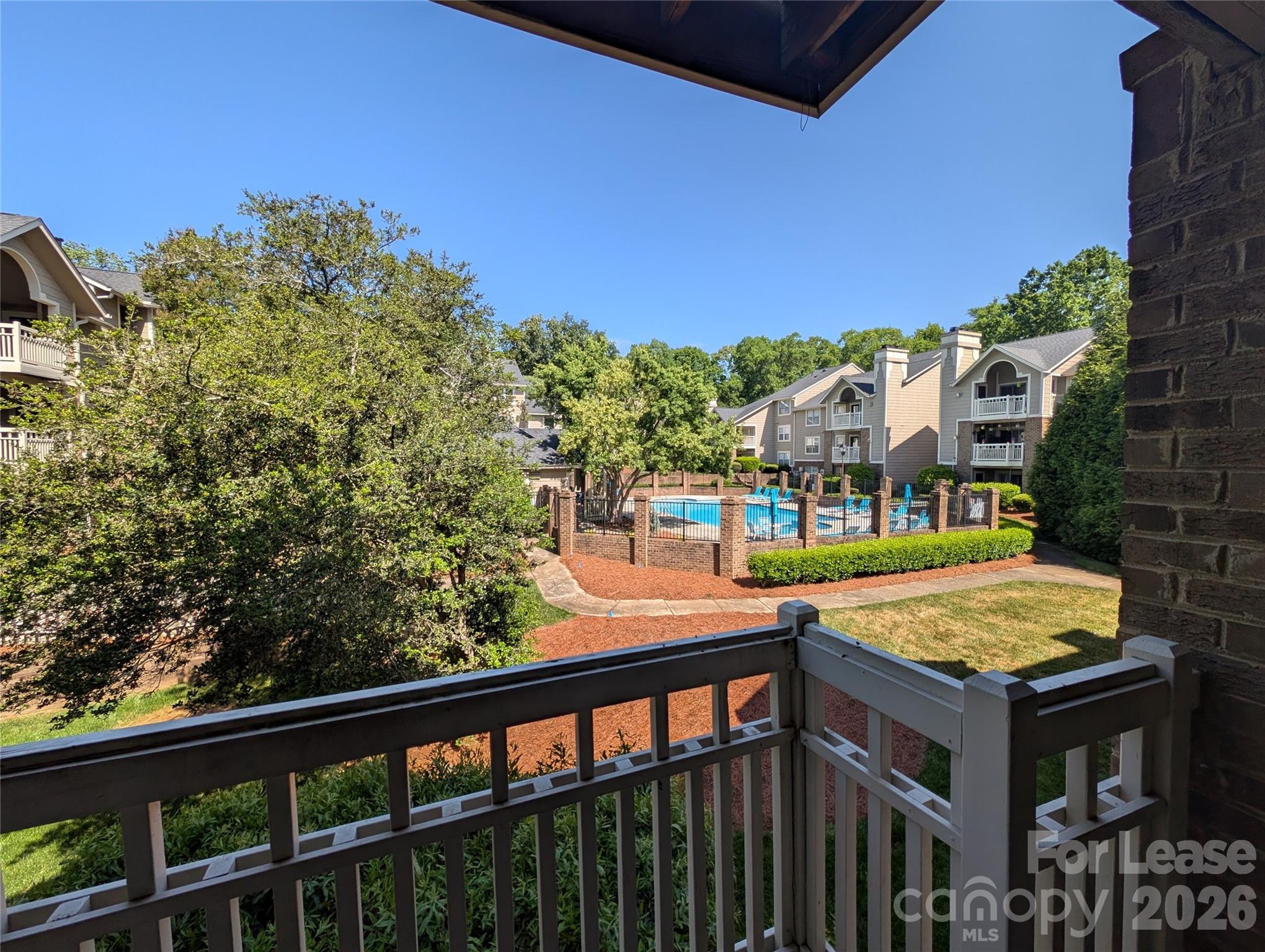 5001 Sharon Road, Unit K Charlotte, NC 28210 - Photo 7 of 24 a view of a balcony with lake view