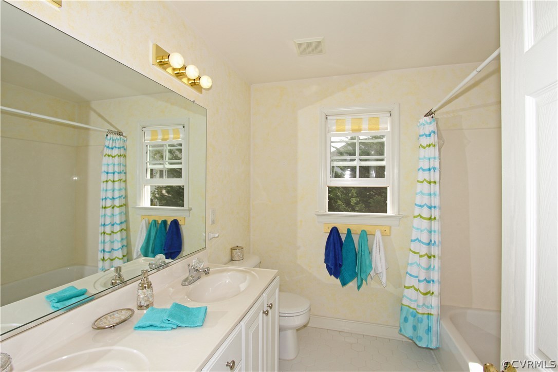 1106 Goswick Ridge Road Midlothian, VA 23114 - Photo 14 of 21 a bath room with a sink and a mirror