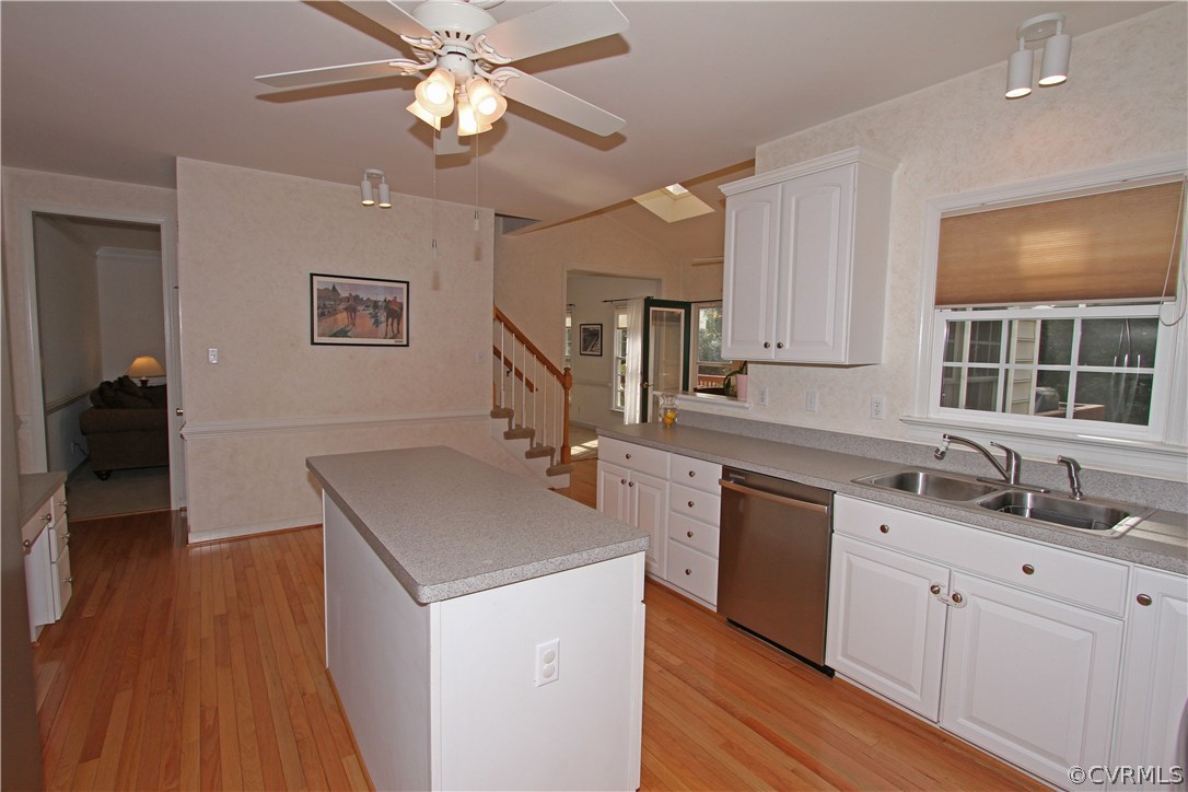 1106 Goswick Ridge Road Midlothian, VA 23114 - Photo 2 of 21 a kitchen with cabinets a sink and wooden floor
