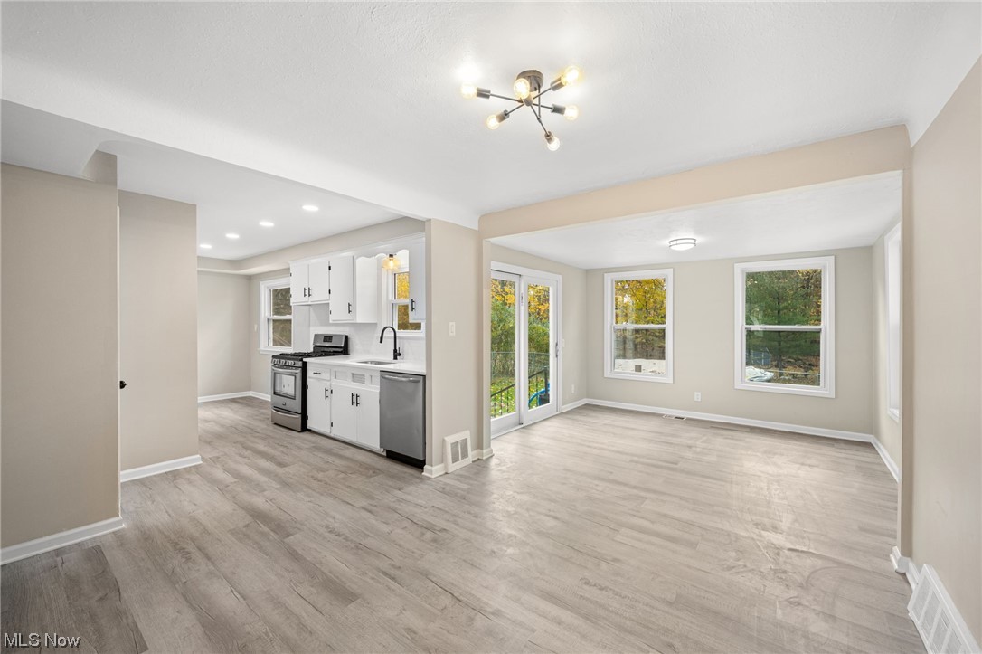 4892 Corliss Road Cleveland, OH 44124 - Photo 3 of 35 Dining room and Kitchen