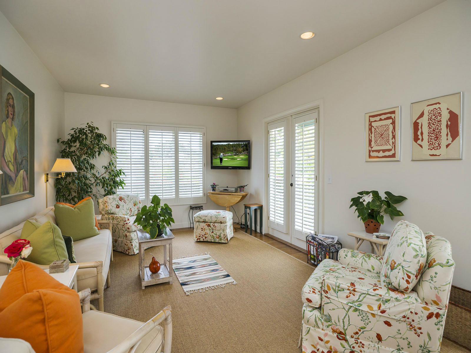 2170 East Valley Road Montecito, CA 93108 - Photo 5 of 10 a living room with furniture and flowers