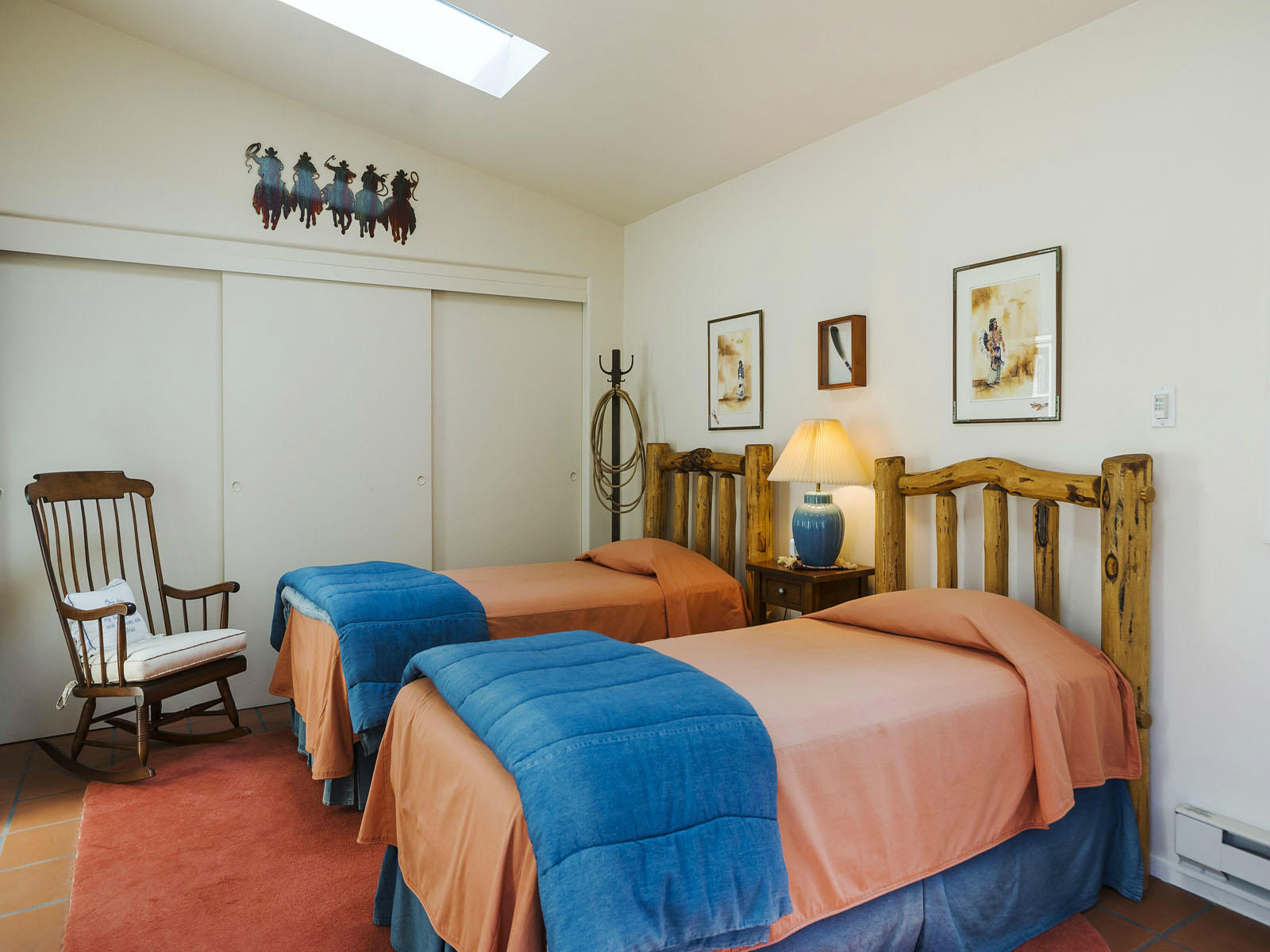 2170 East Valley Road Montecito, CA 93108 - Photo 9 of 10 a bedroom with two beds and a chair
