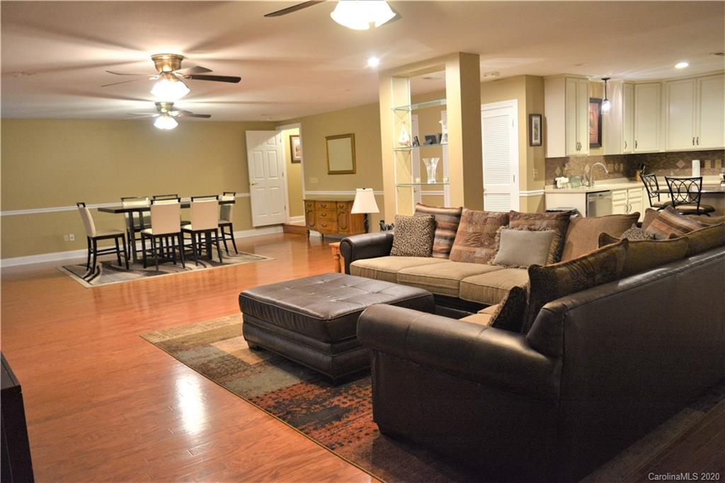 121 Spring Branch Road Fort Mill, SC 29715 - Photo 14 of 17 a living room with furniture and a large window