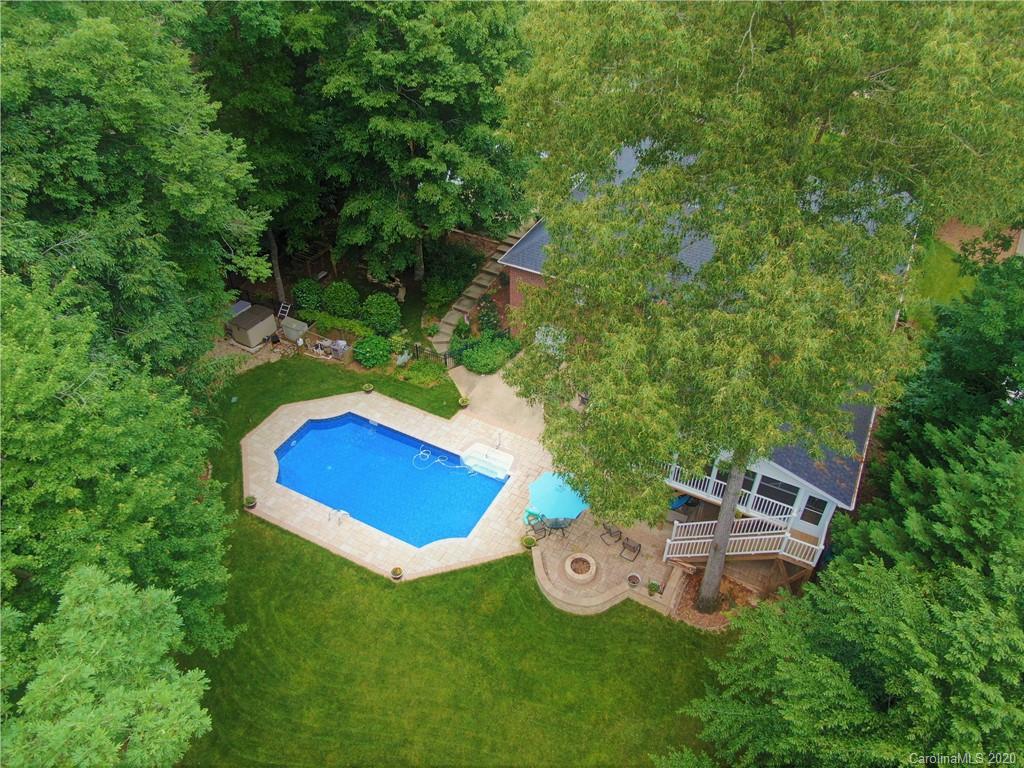 121 Spring Branch Road Fort Mill, SC 29715 - Photo 3 of 17 an aerial view of a house with backyard space and garden
