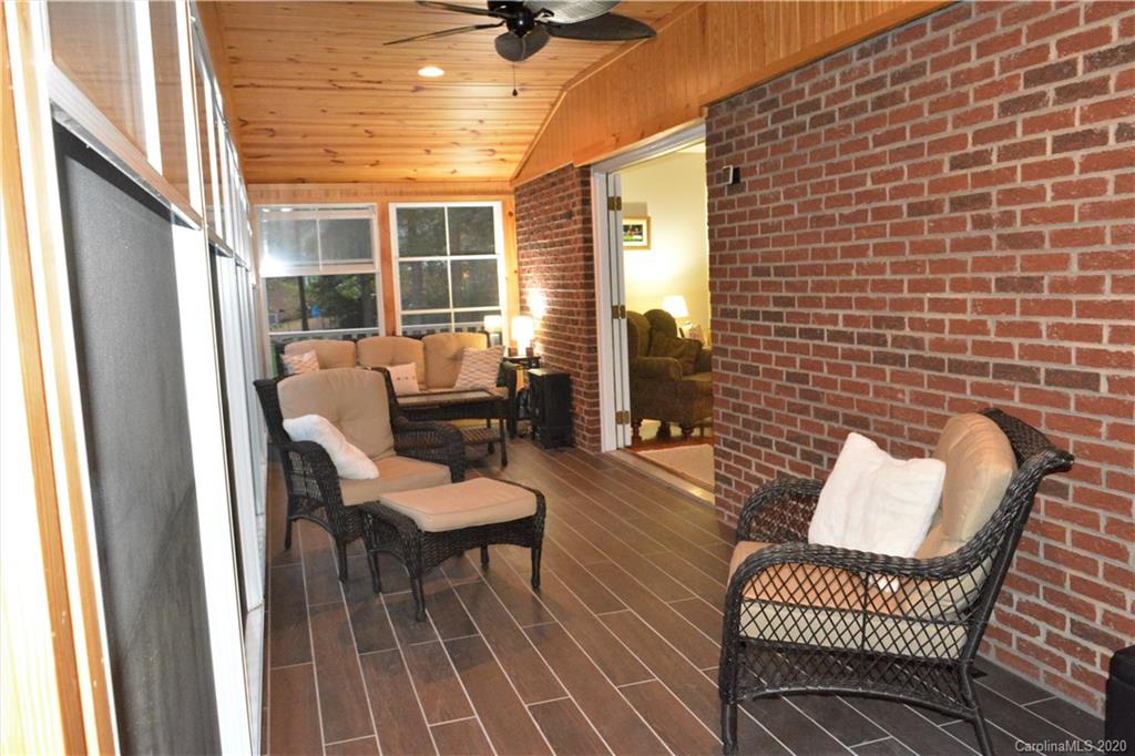 121 Spring Branch Road Fort Mill, SC 29715 - Photo 5 of 17 a balcony with furniture and a potted plant