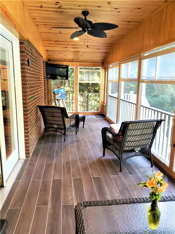 121 Spring Branch Road Fort Mill, SC 29715 - Photo 6 of 17 a balcony with wooden floor and outdoor seating