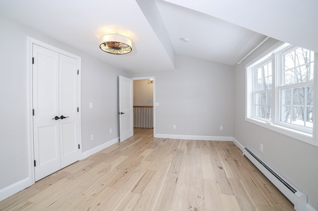 3 Woods Road Westminster, MA 01473 - Photo 22 of 41 wooden floor in an empty room with a window