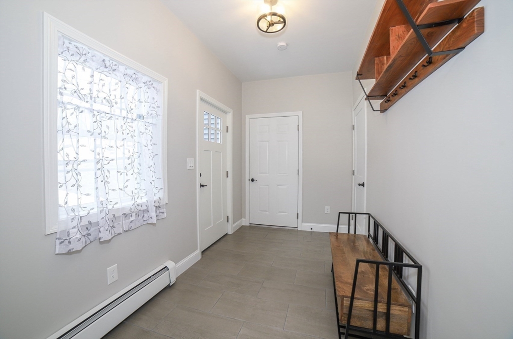 3 Woods Road Westminster, MA 01473 - Photo 31 of 41 a view of entryway with window and stairs