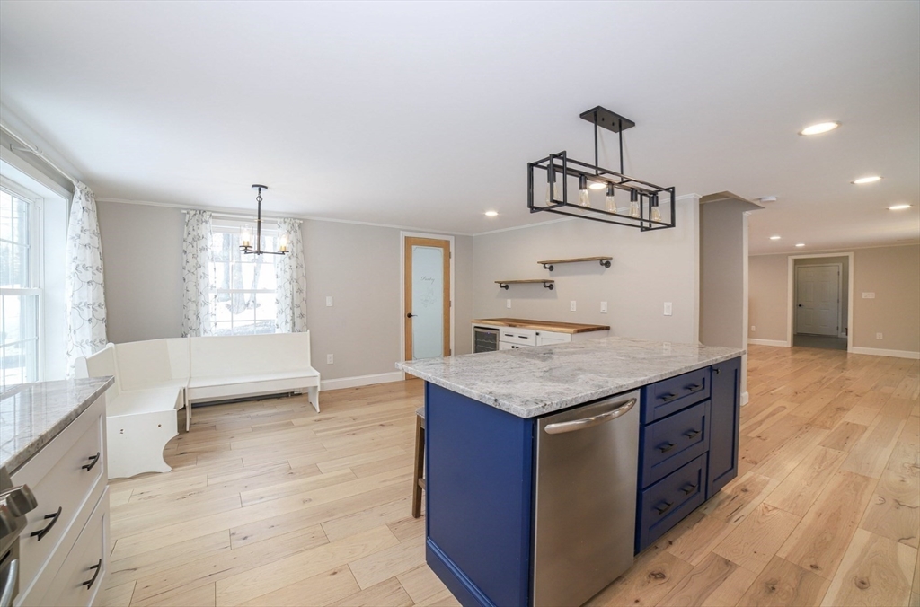 3 Woods Road Westminster, MA 01473 - Photo 4 of 41 a kitchen with granite countertop a stove and a sink