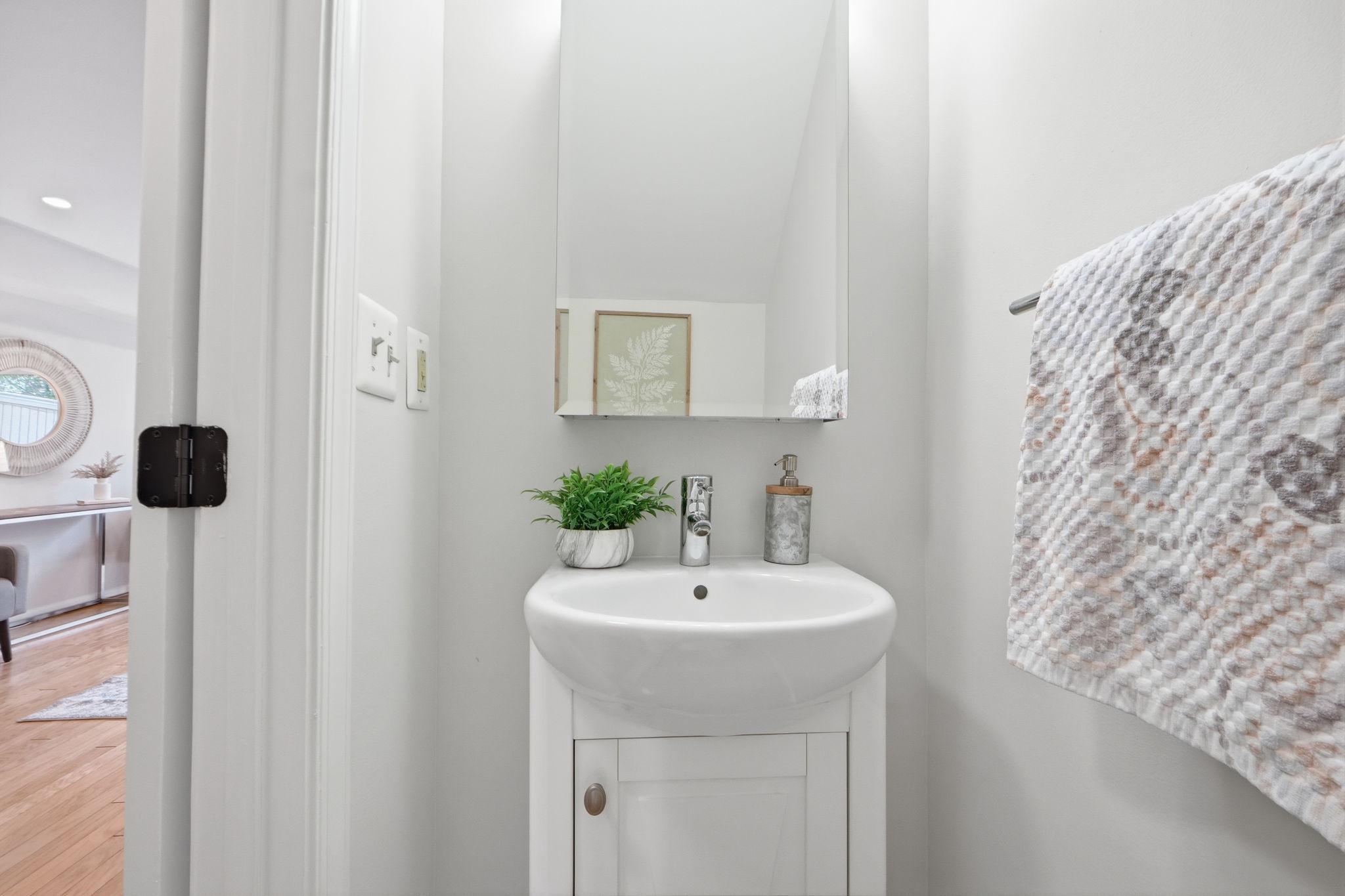 8230 Carrleigh Parkway, Unit 84 Springfield, VA 22152 - Photo 12 of 24 Chic and serene main level powder room