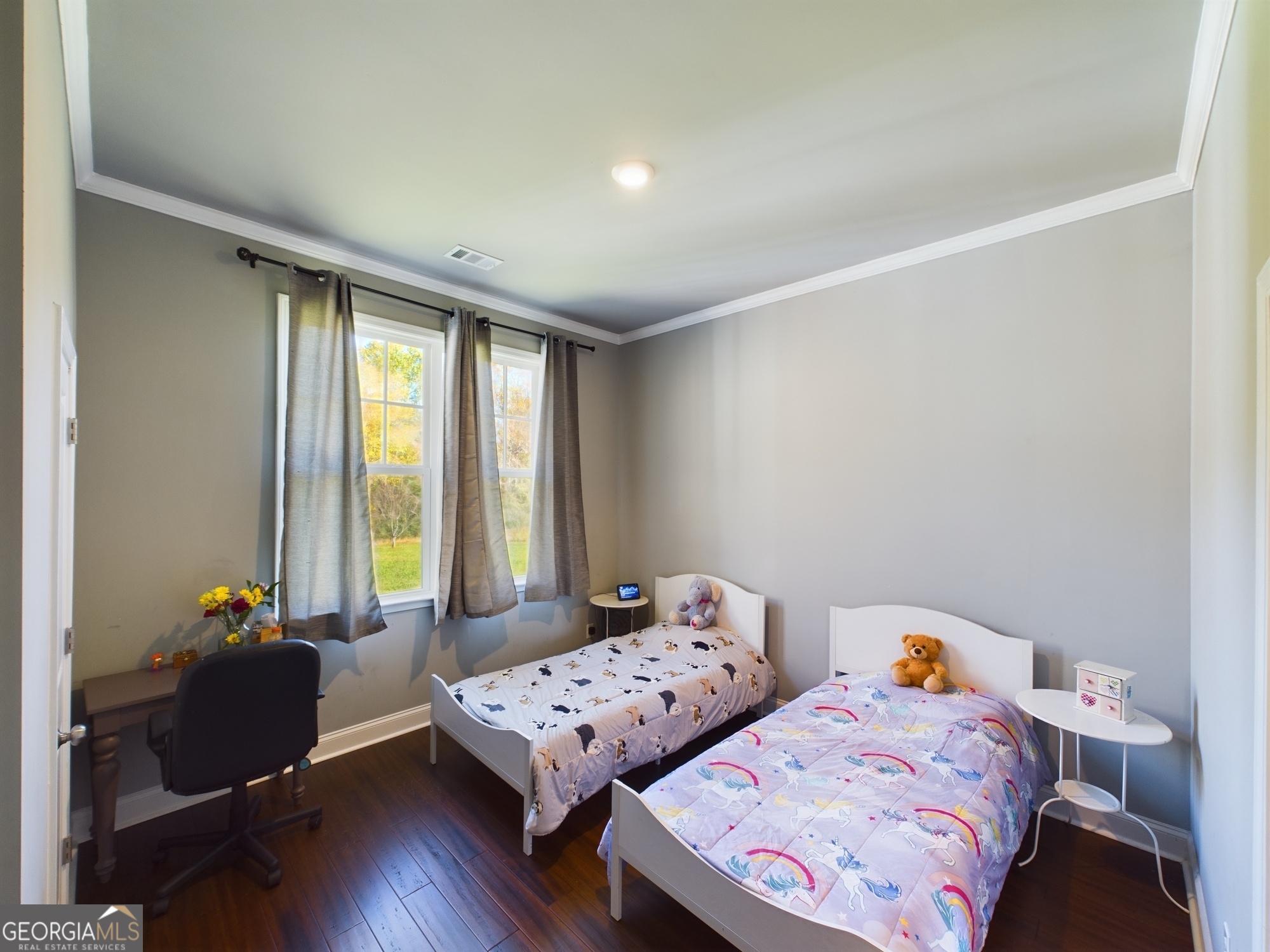 4305 High Falls Road Griffin, GA 30224 - Photo 22 of 33 a bedroom with two beds and large windows