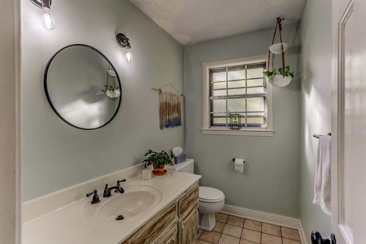381 Rutledge Street Collierville, TN 38017 - Photo 12 of 23 a bathroom with a sink toilet and mirror