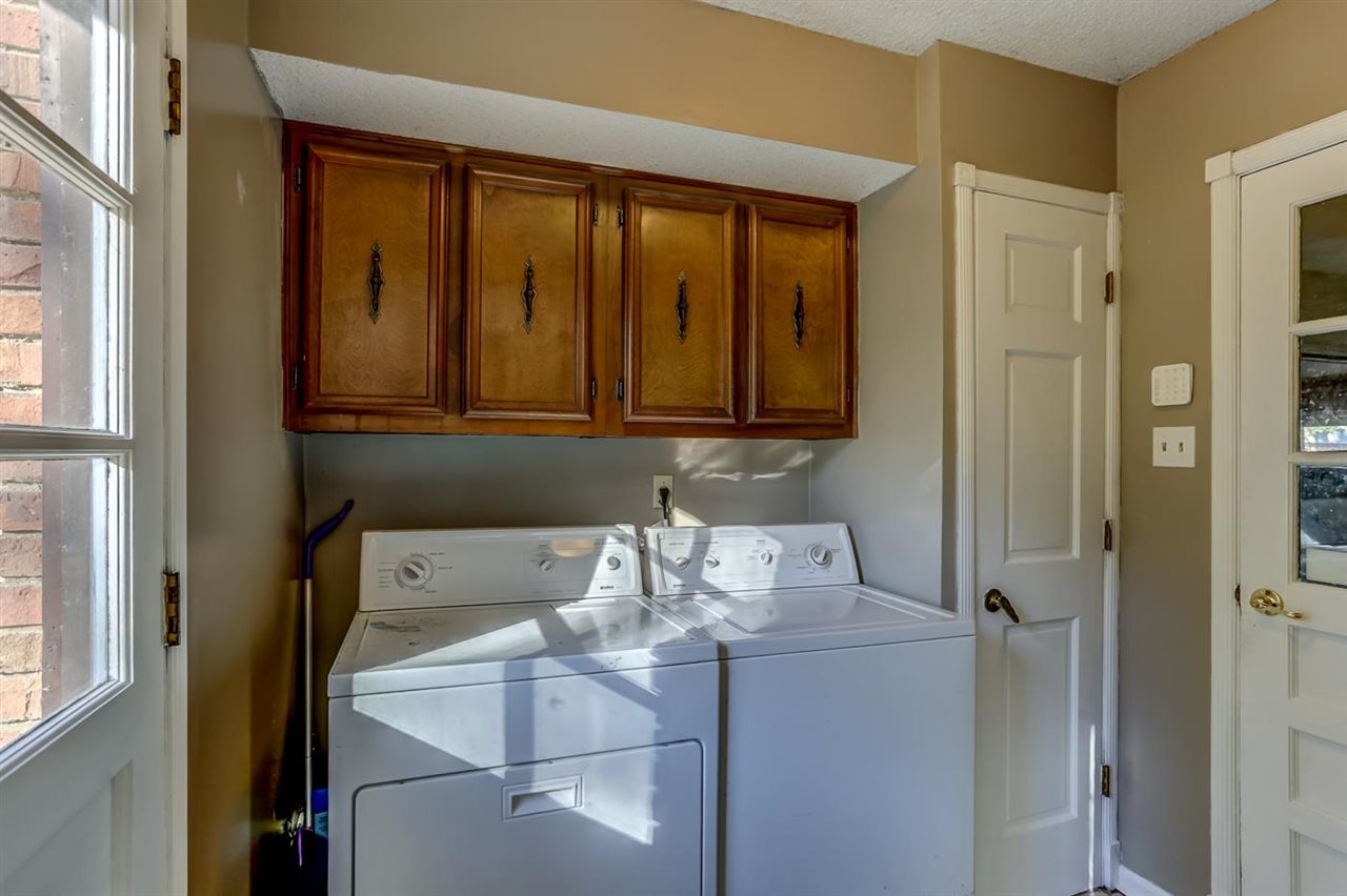 381 Rutledge Street Collierville, TN 38017 - Photo 13 of 23 a utility room with dryer and washer