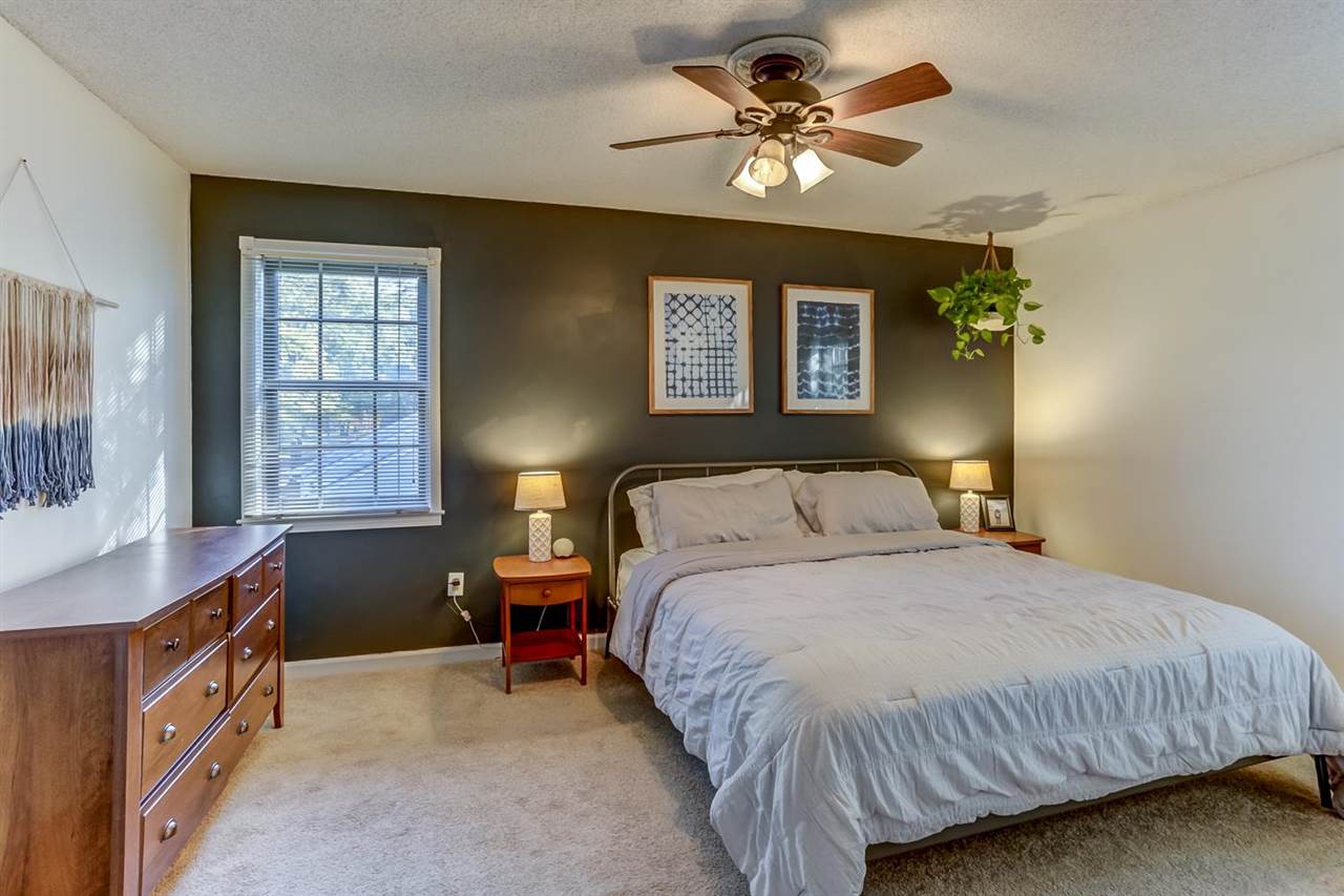 381 Rutledge Street Collierville, TN 38017 - Photo 15 of 23 a bedroom with a bed dresser and a window