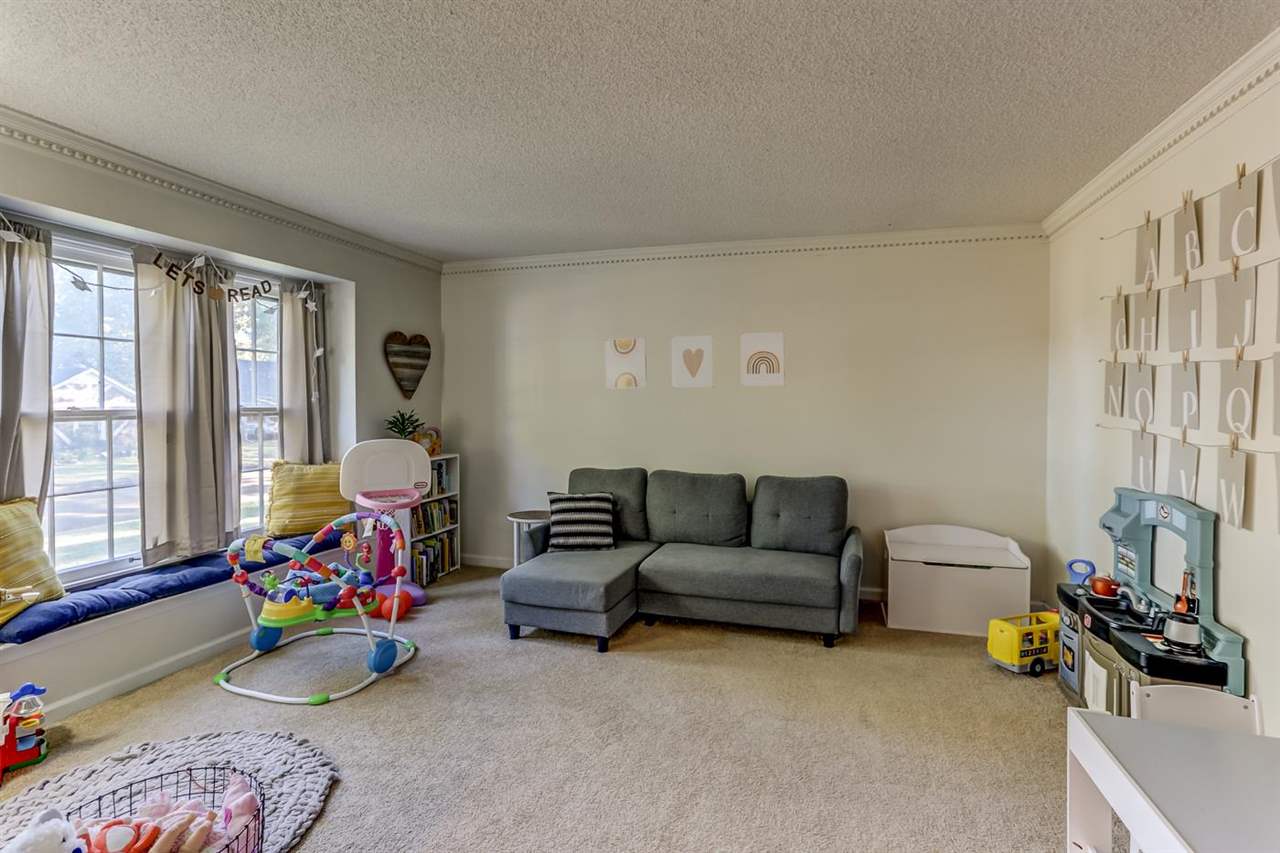 381 Rutledge Street Collierville, TN 38017 - Photo 3 of 23 a living room with furniture and a window