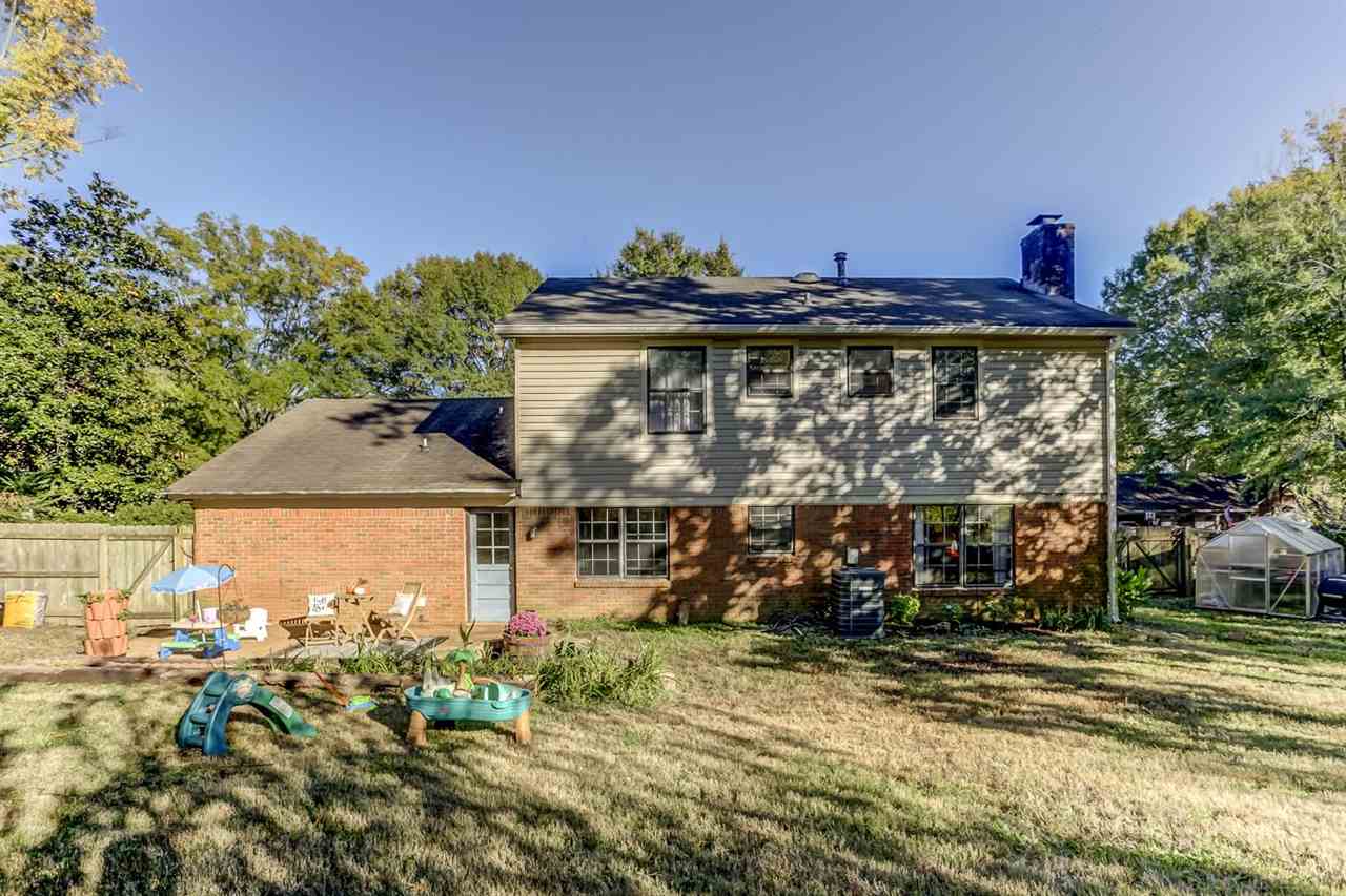 381 Rutledge Street Collierville, TN 38017 - Photo 21 of 23 a front view of a house with garden