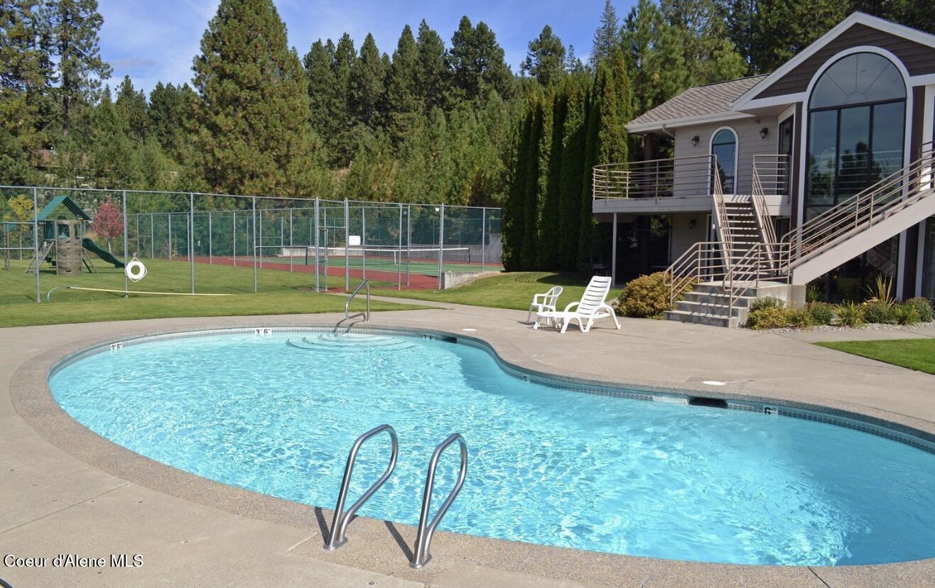 952 Rutledge Court Coeur D'Alene, ID 83814 - Photo 36 of 37 Pool, Clubhouse, Green Space