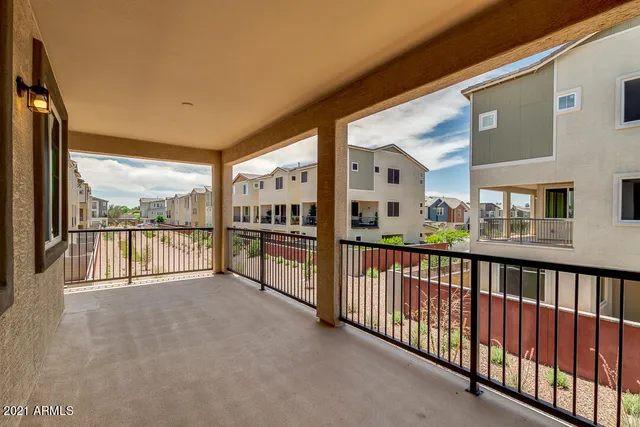 a view of a house with porch and wooden floor