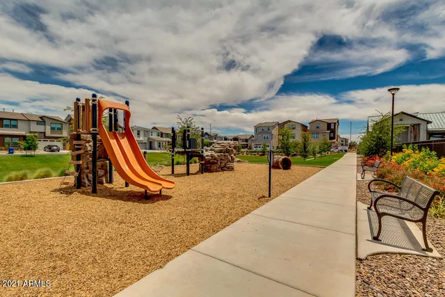 a large building with trees in front of it