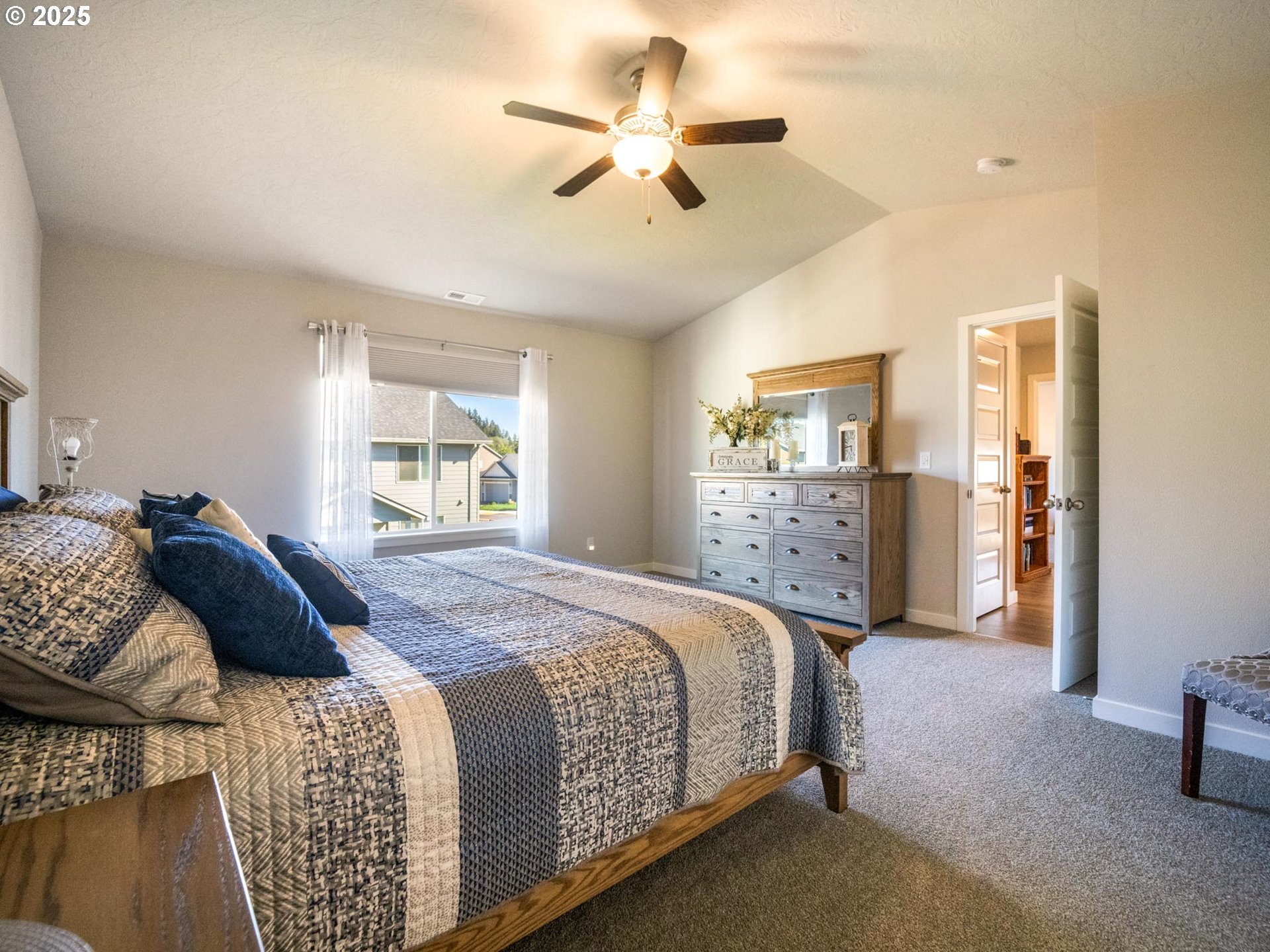 856 Maple Street Brownsville, OR 97327 - Photo 16 of 47 a bedroom with a bed and window