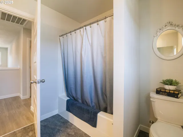a bathroom with a toilet and a sink