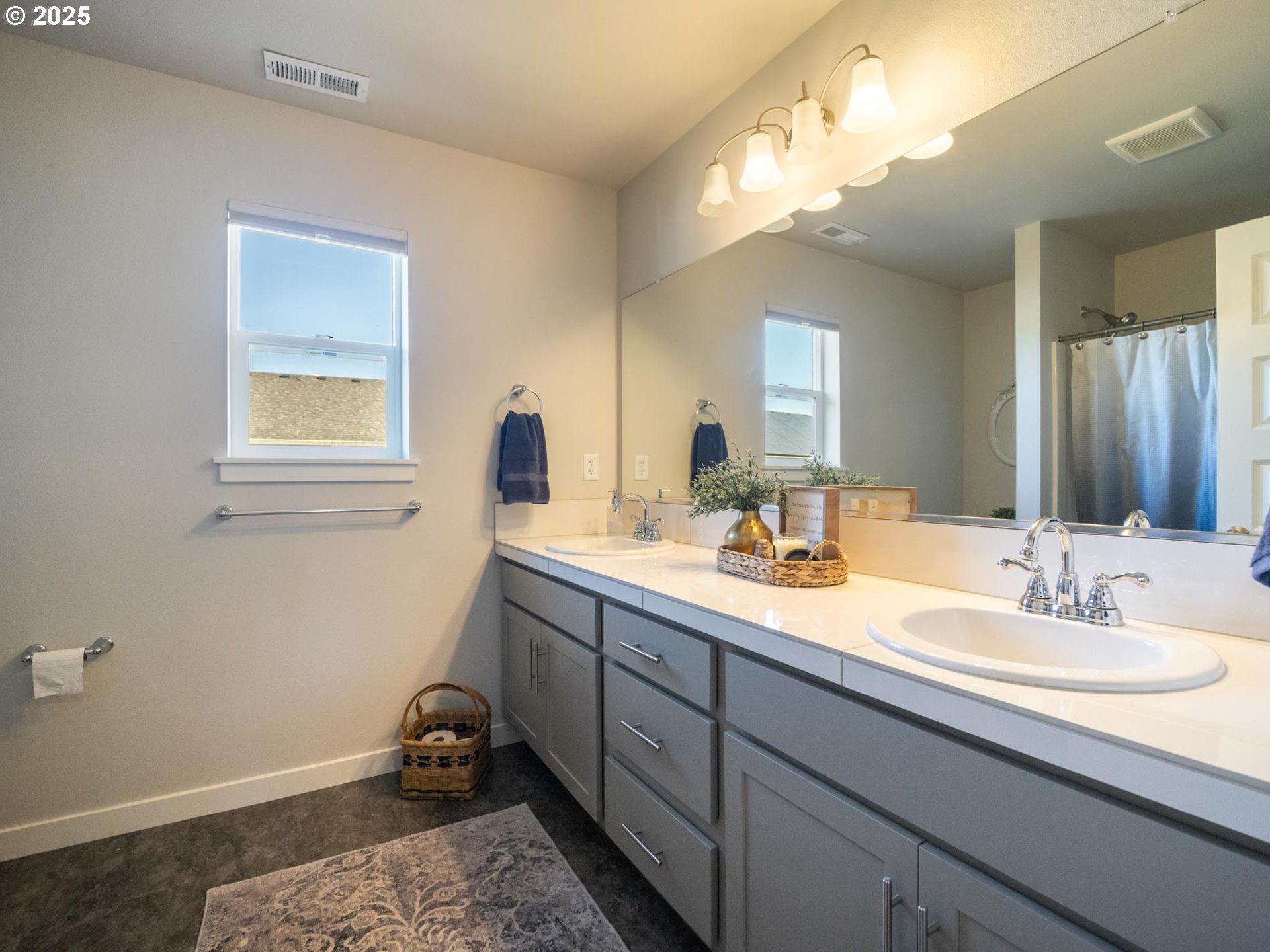 856 Maple Street Brownsville, OR 97327 - Photo 26 of 47 a en suite bathroom with a sink and a mirror