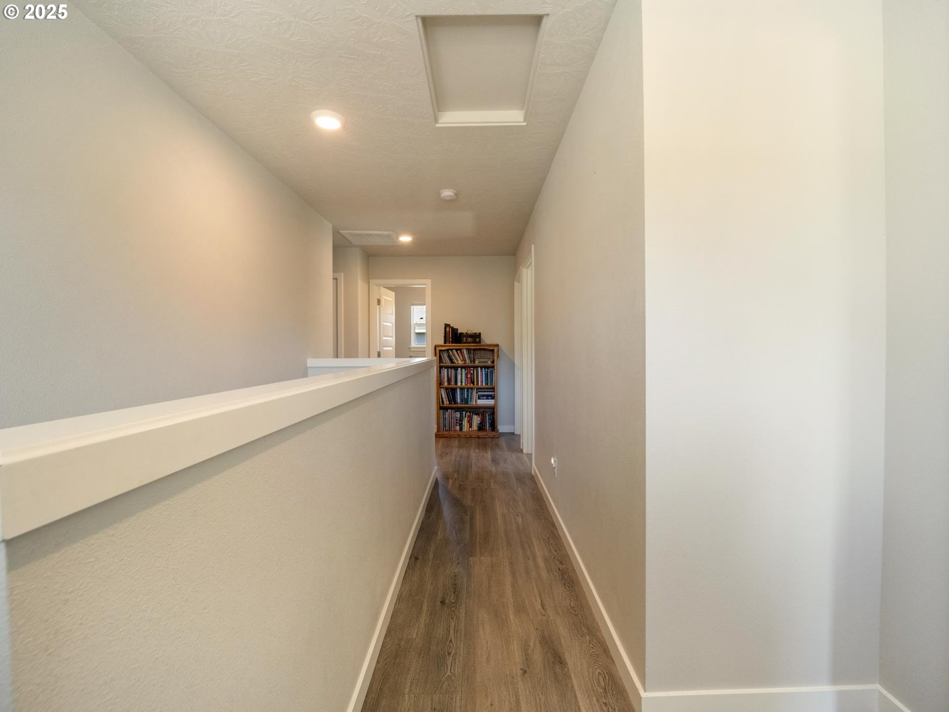 856 Maple Street Brownsville, OR 97327 - Photo 30 of 47 a view of a hallway with wooden floor