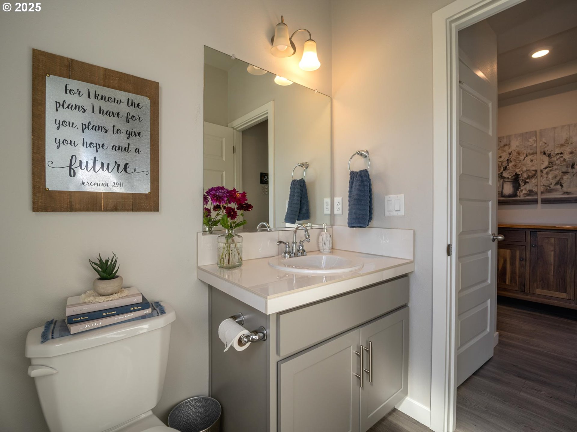 856 Maple Street Brownsville, OR 97327 - Photo 37 of 47 a bathroom with a toilet sink and mirror
