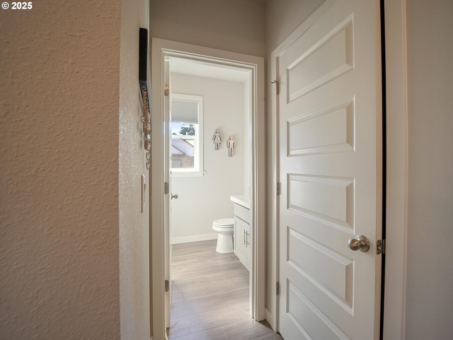 856 Maple Street Brownsville, OR 97327 - Photo 38 of 47 a view of a bathroom from the hallway with toilet