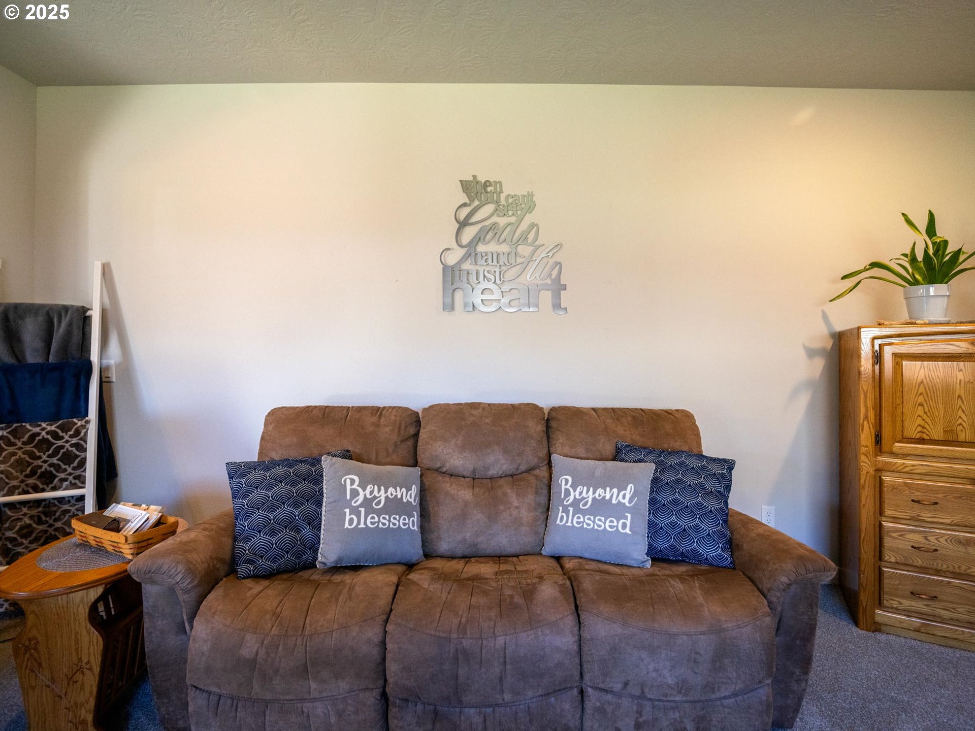 856 Maple Street Brownsville, OR 97327 - Photo 41 of 47 a bedroom with furniture and a potted plant