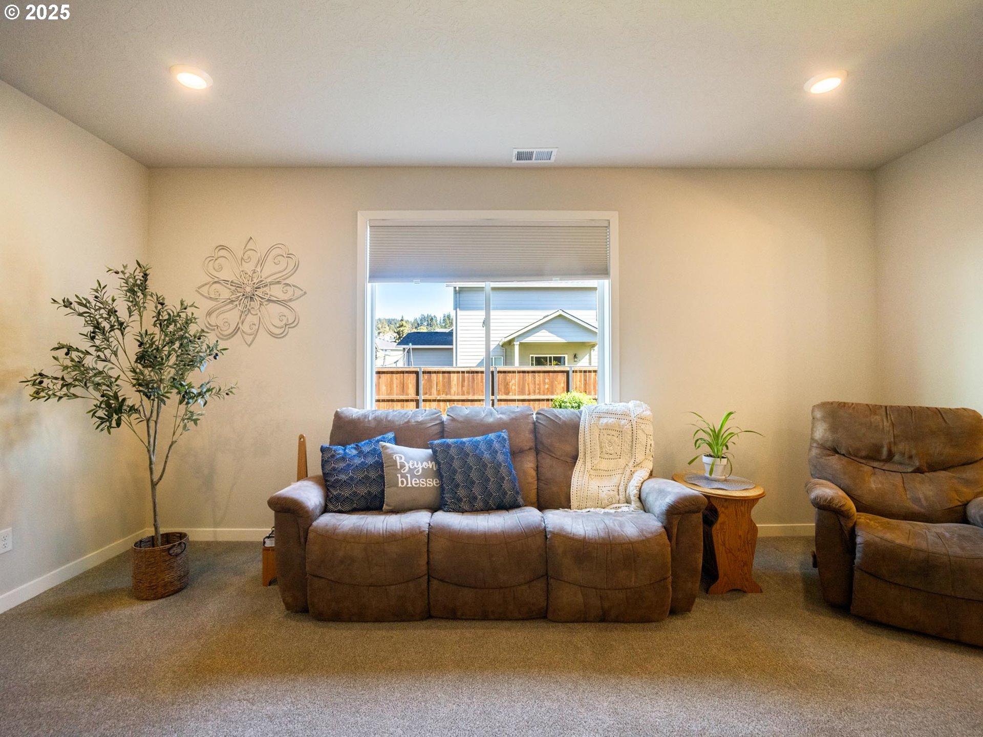 856 Maple Street Brownsville, OR 97327 - Photo 42 of 47 a living room with furniture and a potted plant