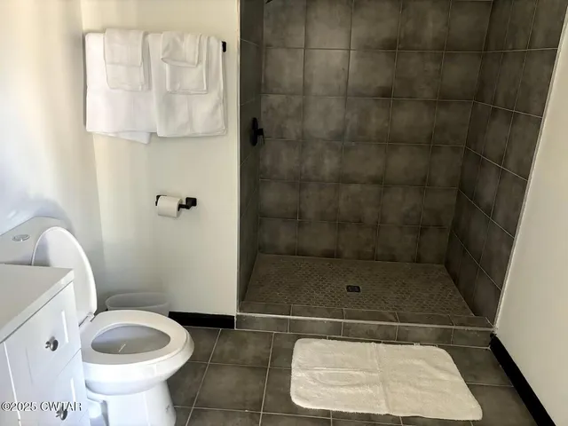 a bathroom with a sink and a toilet