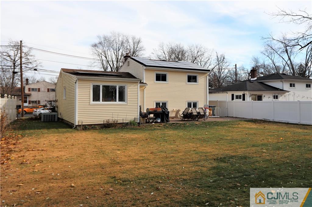 62 Stony Road Edison, NJ 08817 - Photo 18 of 26 a view of a patio with chair and tables