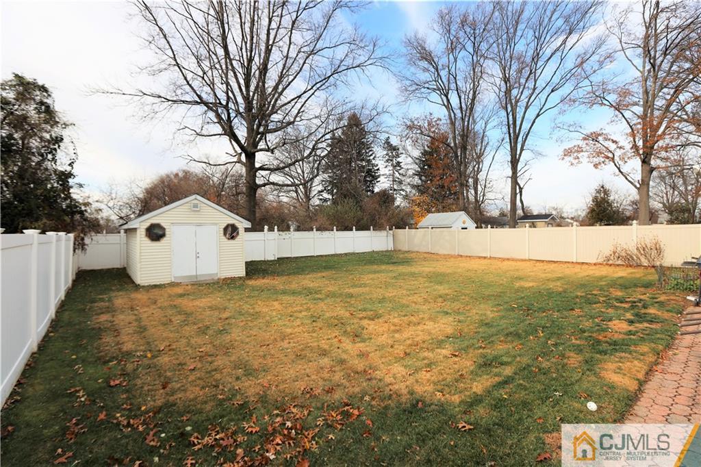 62 Stony Road Edison, NJ 08817 - Photo 22 of 26 a view of white house with a yard