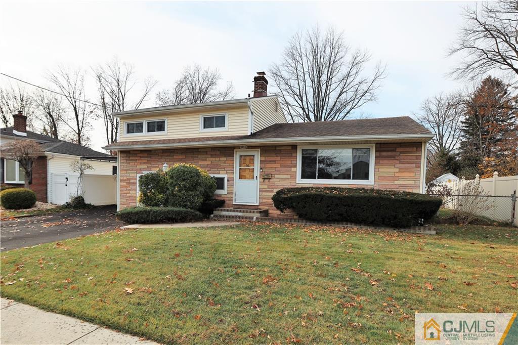 62 Stony Road Edison, NJ 08817 - Photo 25 of 26 a view of a house with a yard and large tree