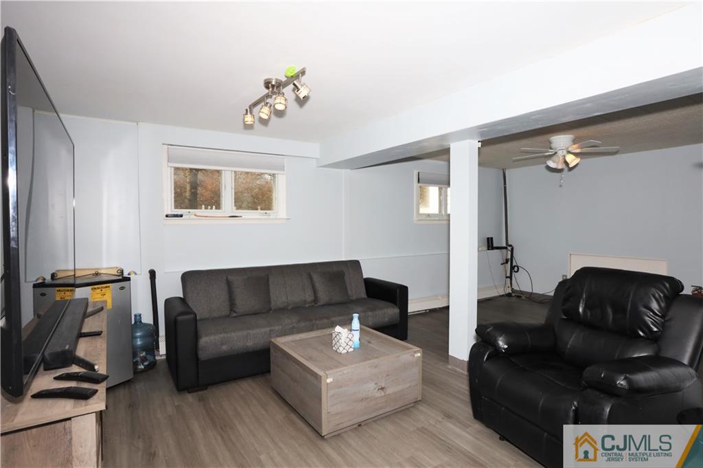 62 Stony Road Edison, NJ 08817 - Photo 8 of 26 a living room with furniture