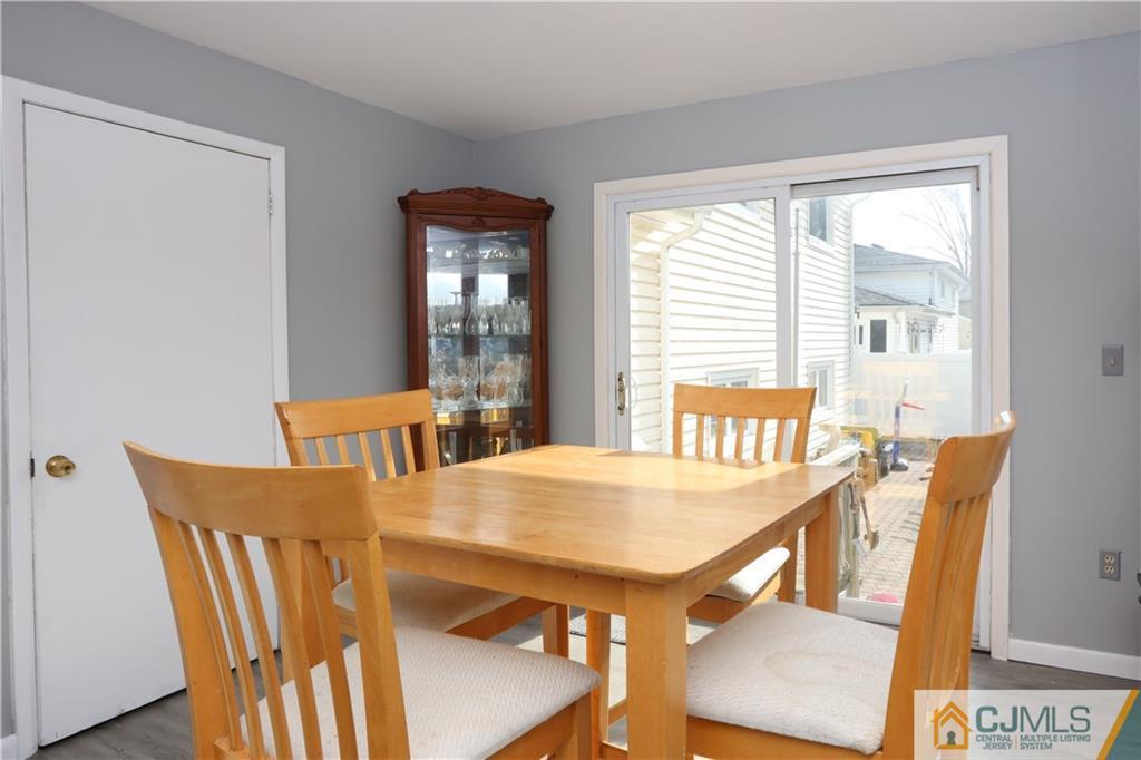 62 Stony Road Edison, NJ 08817 - Photo 9 of 26 a view of a dining room with furniture window and wooden floor