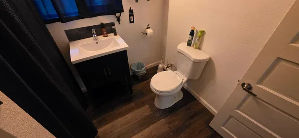 a bathroom with a sink and a toilet