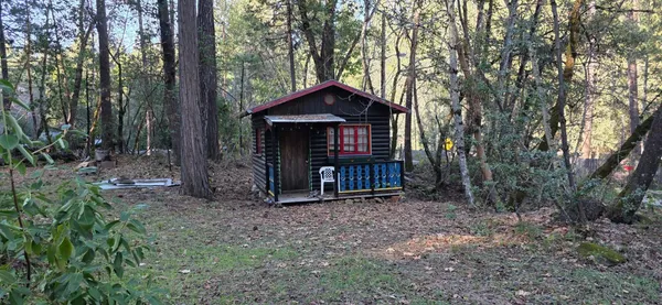 a view of backyard with green space