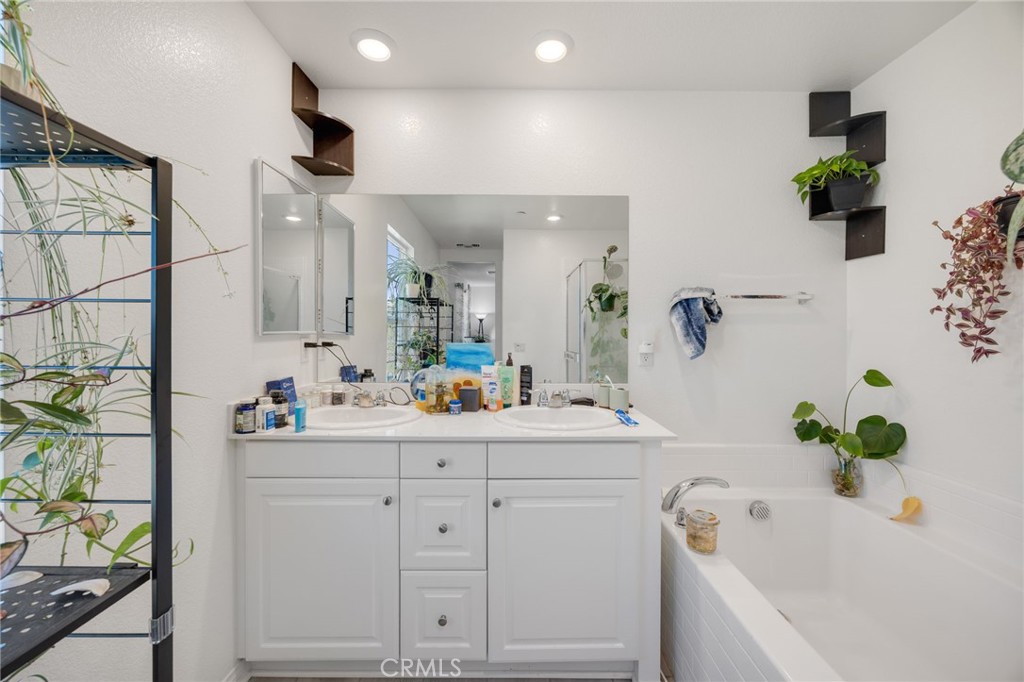 21192 Telegraph Road Riverside, CA 92507 - Photo 13 of 35 a white bath tub sitting in a bathroom