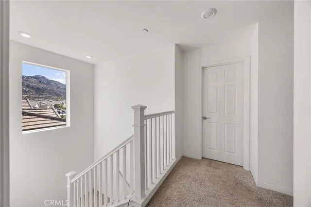 a view of a hallway with entryway