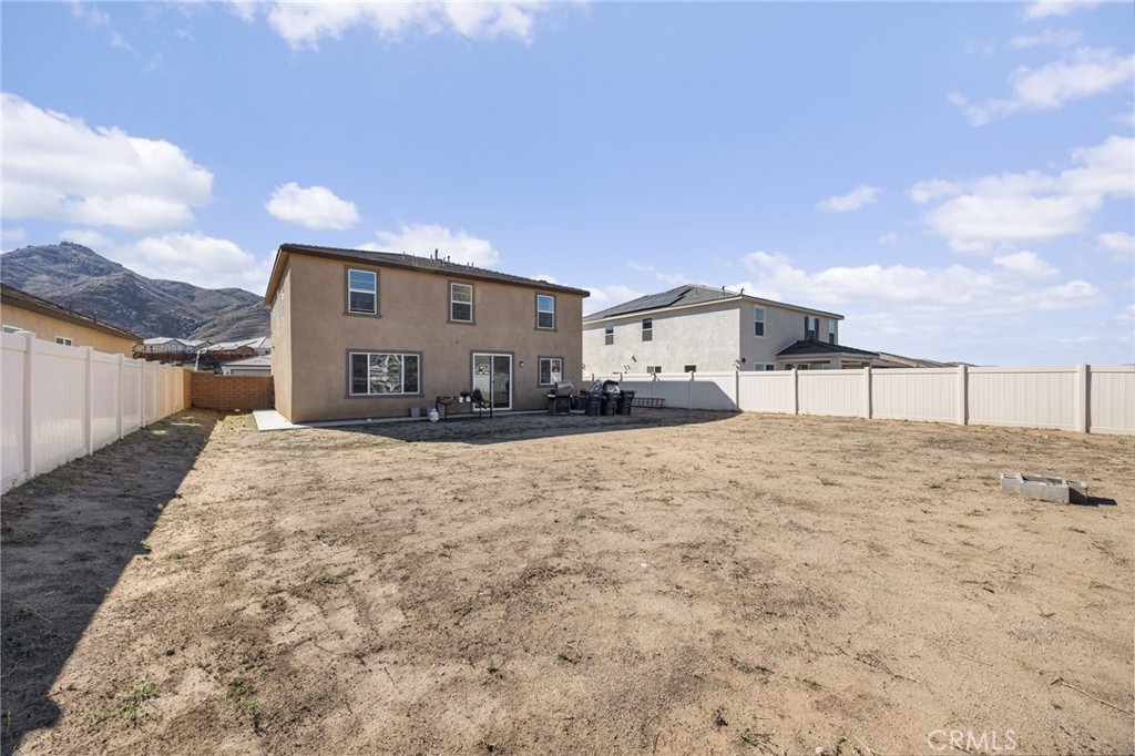 21192 Telegraph Road Riverside, CA 92507 - Photo 31 of 35 a view of a house with a snow on the road