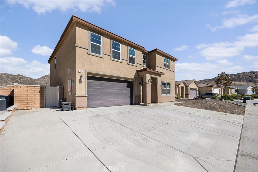 21192 Telegraph Road Riverside, CA 92507 - Photo 35 of 35 a front view of a house with a yard