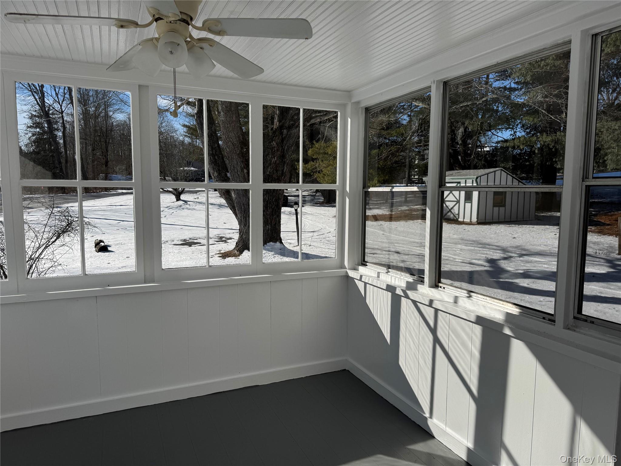 793 Fiddlers Bridge Road Rhinebeck, NY 12572 - Photo 14 of 24 Sunporch with Ceiling Fan & Door to Garden