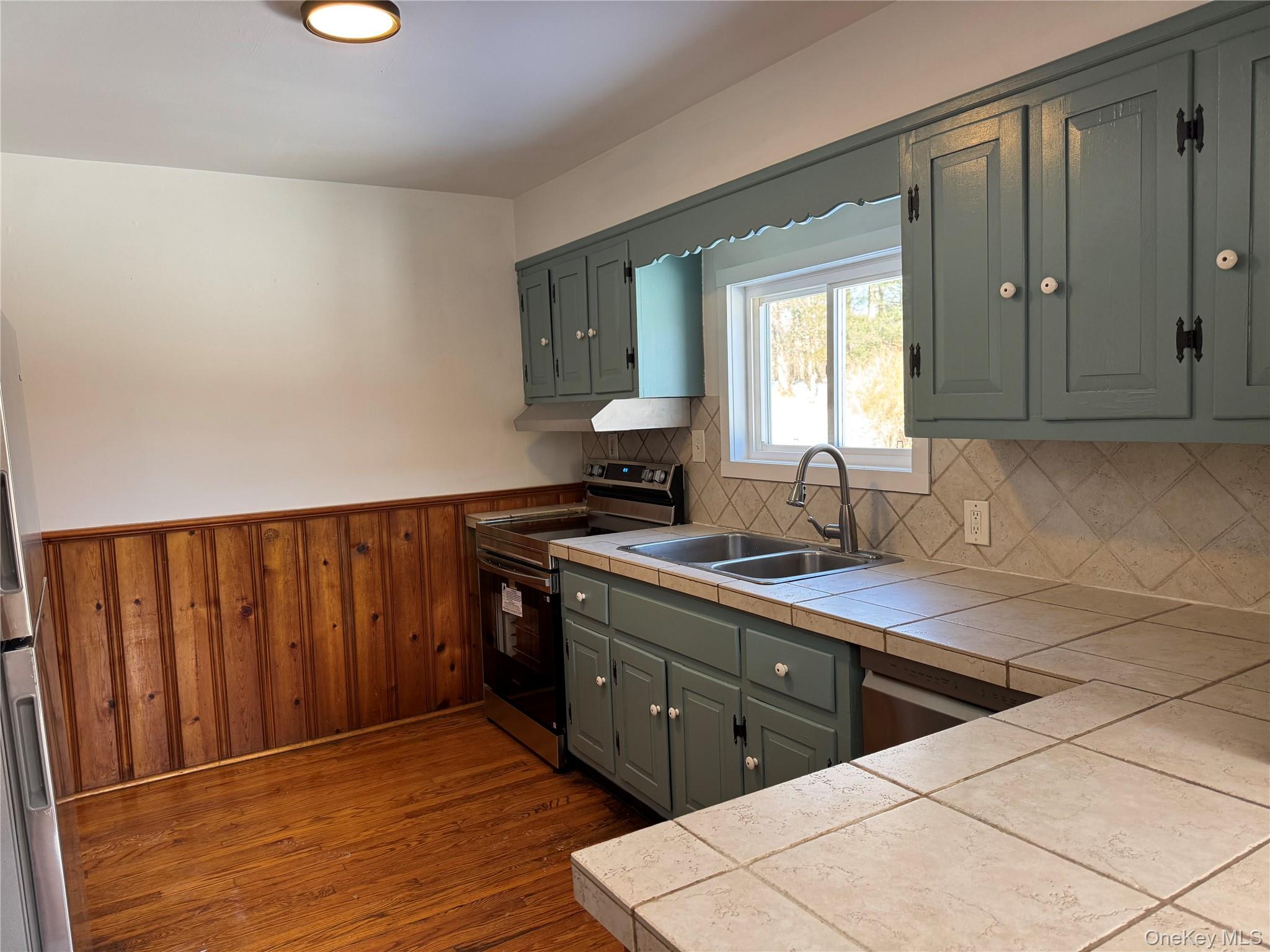 793 Fiddlers Bridge Road Rhinebeck, NY 12572 - Photo 17 of 24 Kitchen has Wood Cabinets & Tile Counter Tops