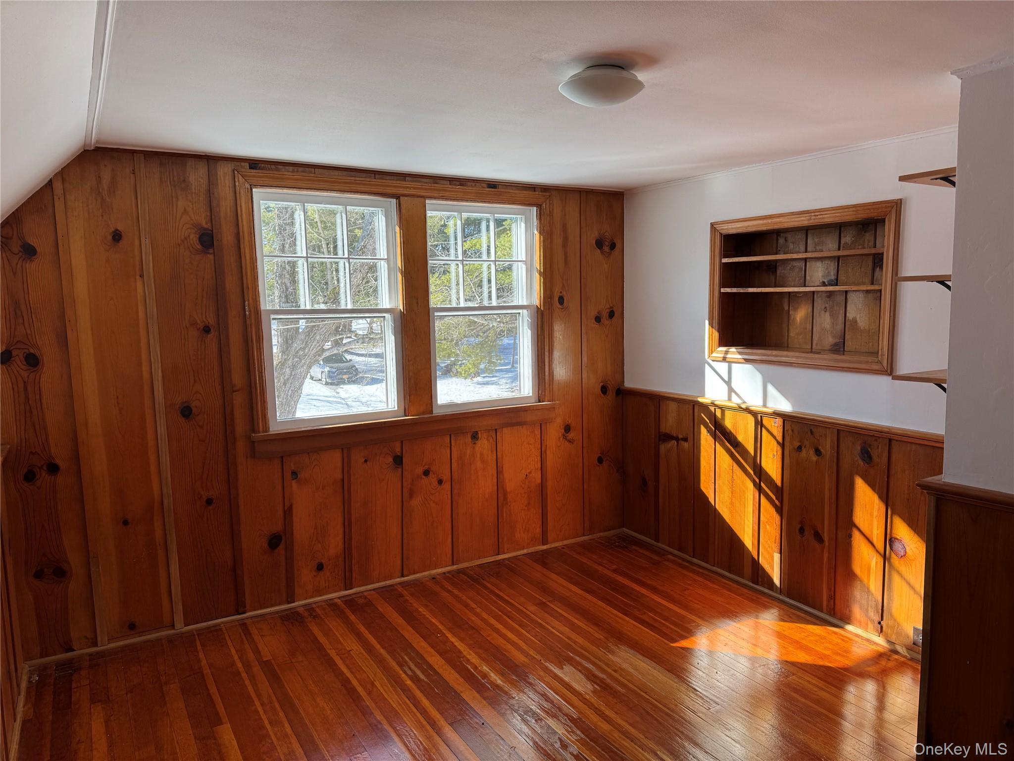 793 Fiddlers Bridge Road Rhinebeck, NY 12572 - Photo 23 of 24 2nd Bedroom has 2 Windows, Oak Floors, Built-in Shelving & a Closet